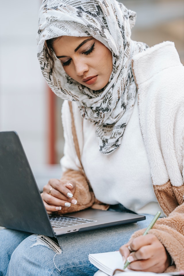 Woman following a how-to-guide